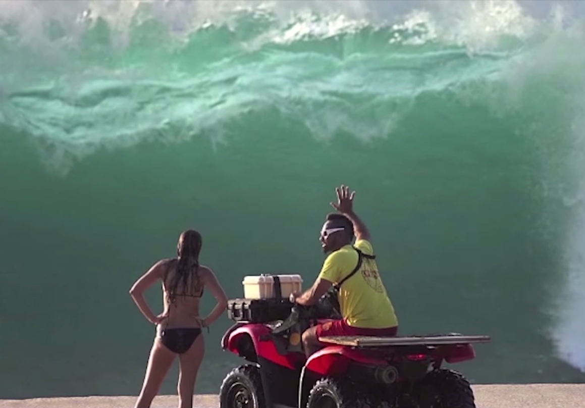 Lifeguard on the beach - huge wave