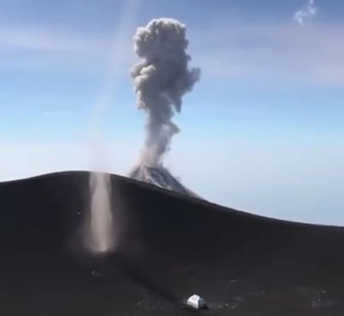 Tourist Filming Dust Devil Catches Volcano Eruption In Background ...