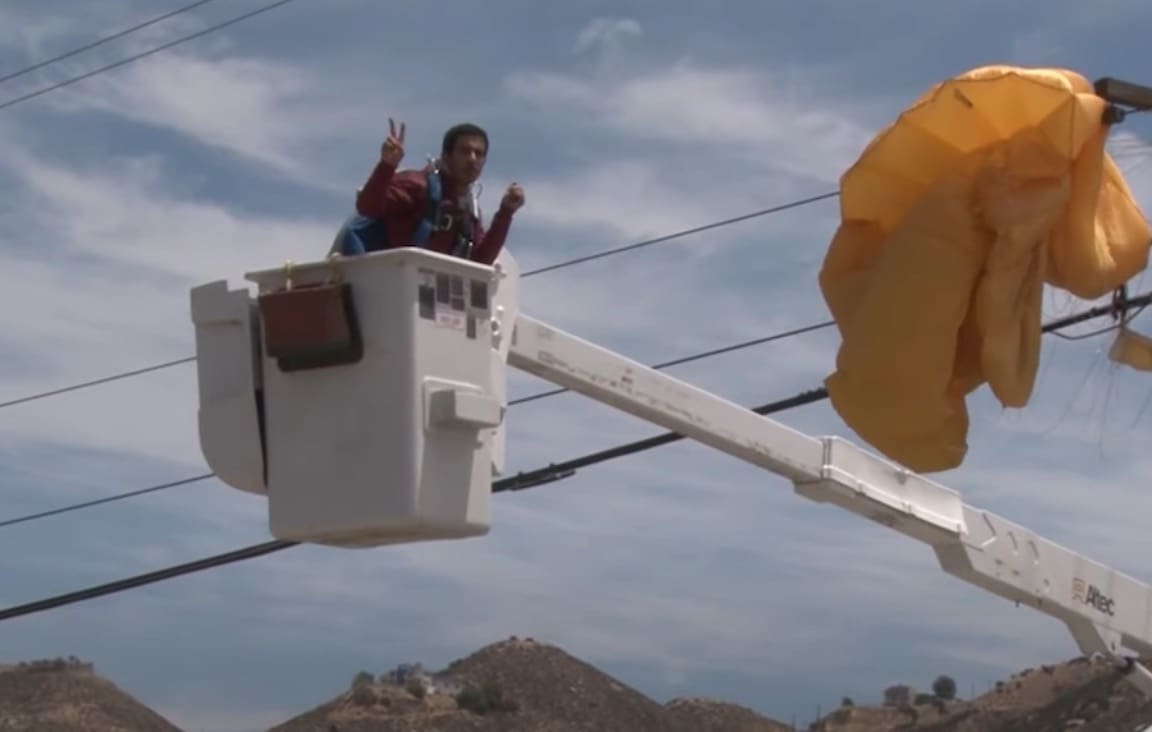 Skydiver Left Dangling 30ft Above Street After Getting Tangled In Power ...