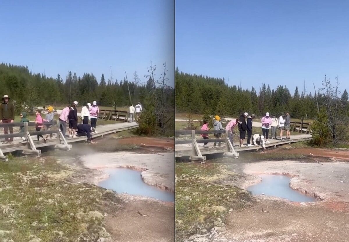 Yellowstone National Park visitors dip hands in geothermal feature.