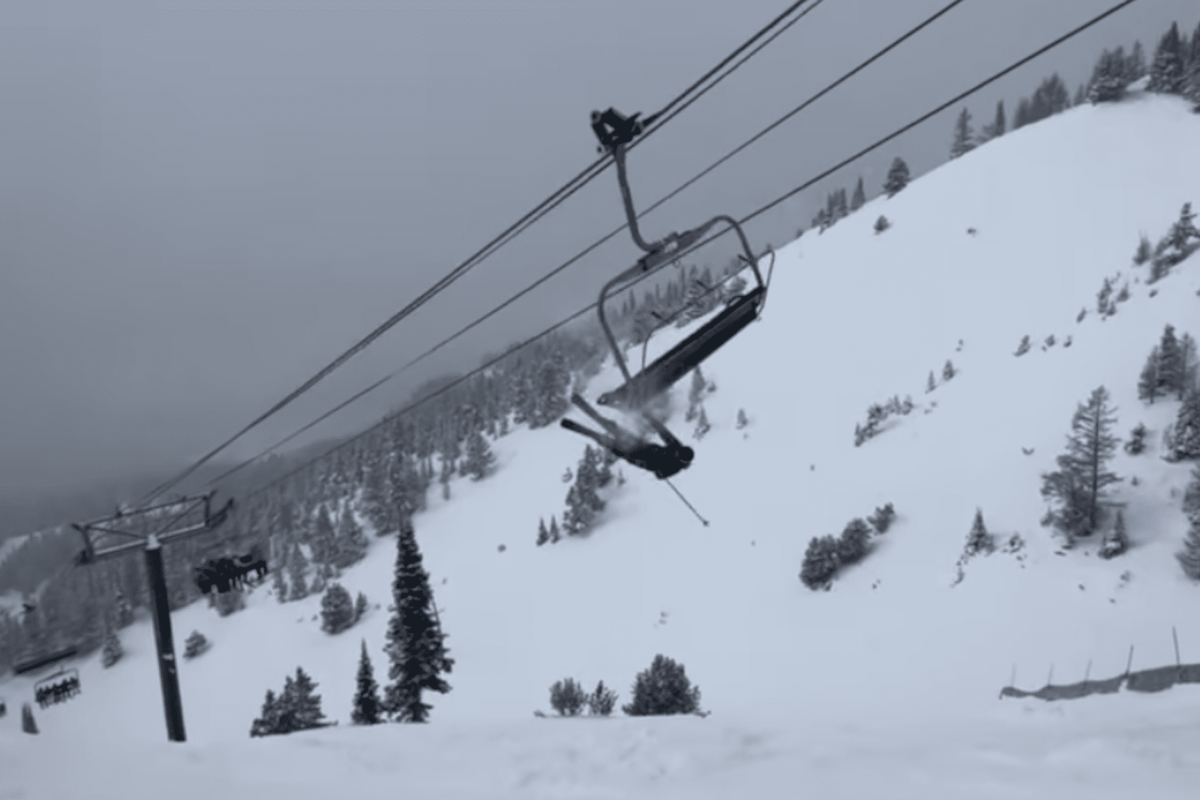 Skier hits chairlift after sending jump.