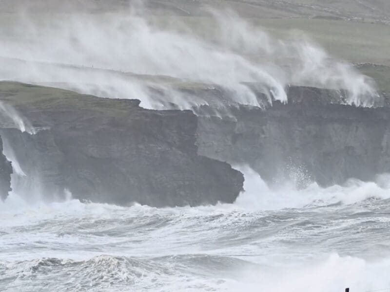 Severe weather creates a reverse waterfall on the Cliffs of Moher.