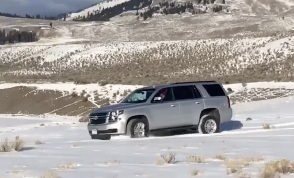 Driver takes large SUV off-road at Yellowstone.