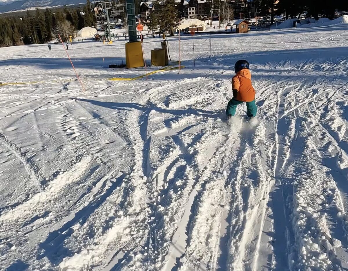 Dan Noakes skis with is son.