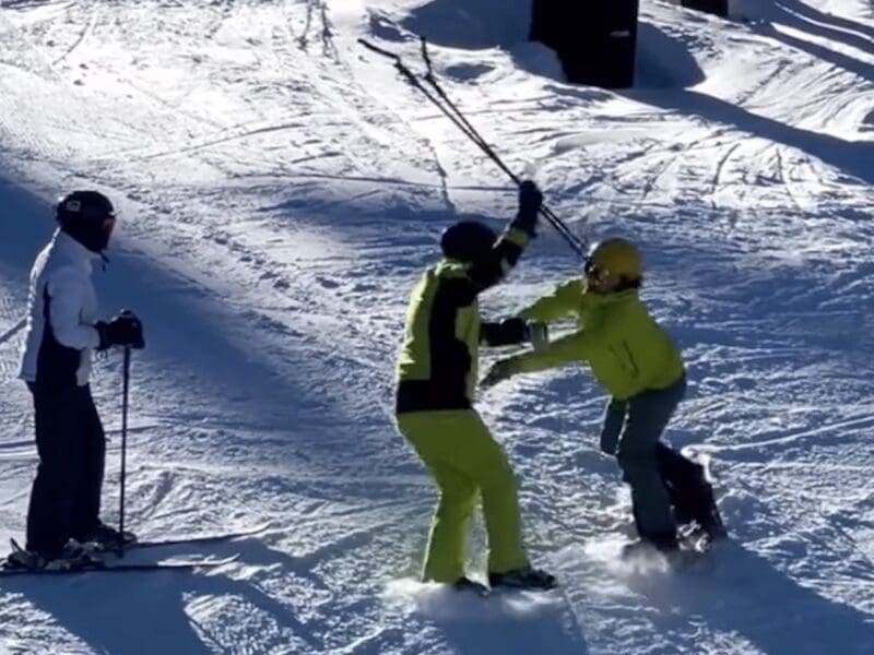 Skier vs snowboarder confrontation