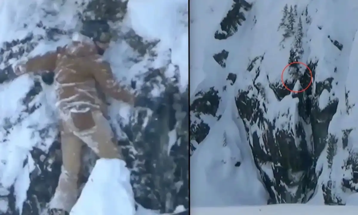 Snowboarder stuck on cliff @ Whistler Blackcomb