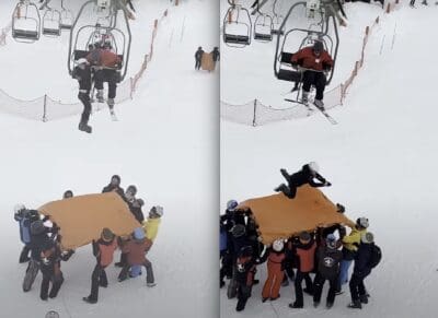 Child dangling from chairlift rescued using makeshift catch blanket