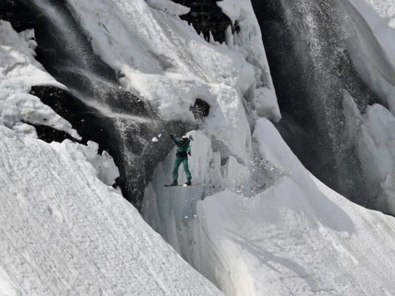 Tuckerman snowboarder falls into waterfall hole.