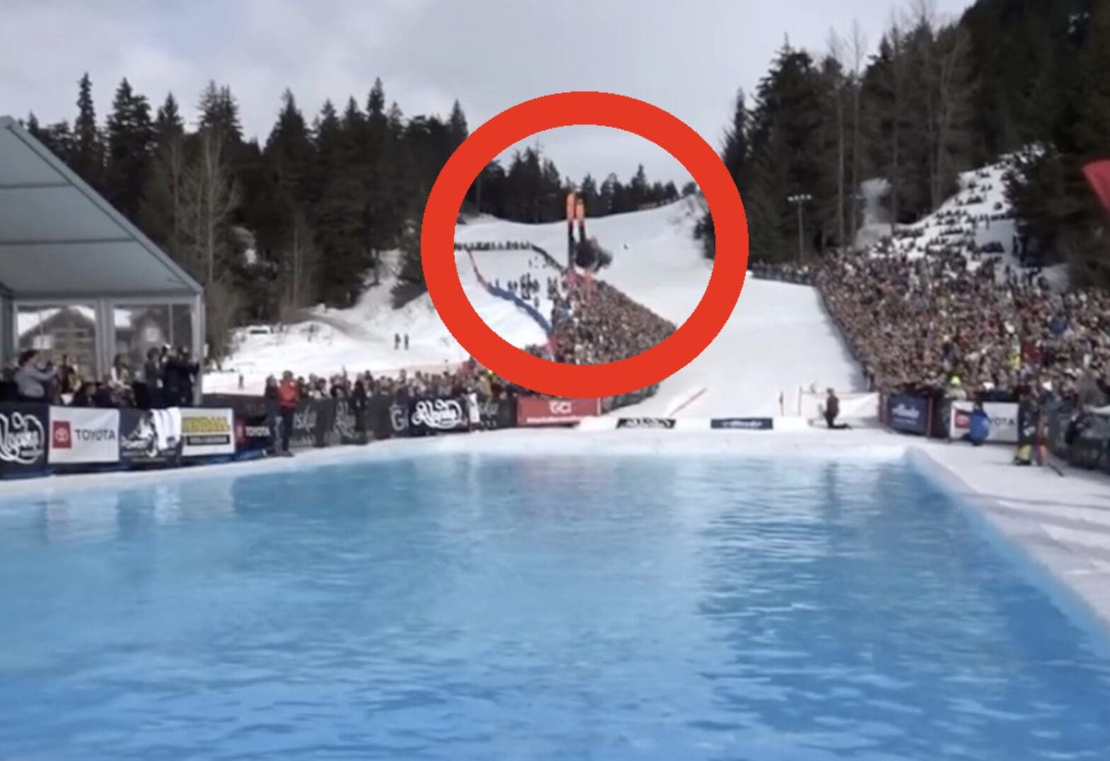 Skier Miraculously Lands Double Backflip Into Water & Rides Away