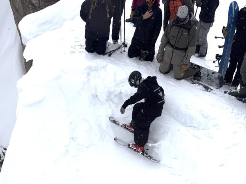 Kid drops into Corbet's Couloir on snowblades.