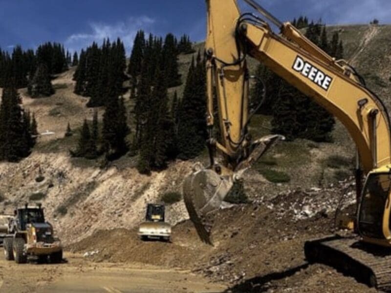 Trucks work to clear debris from the from the Loveland Pass (US 6) landslide.