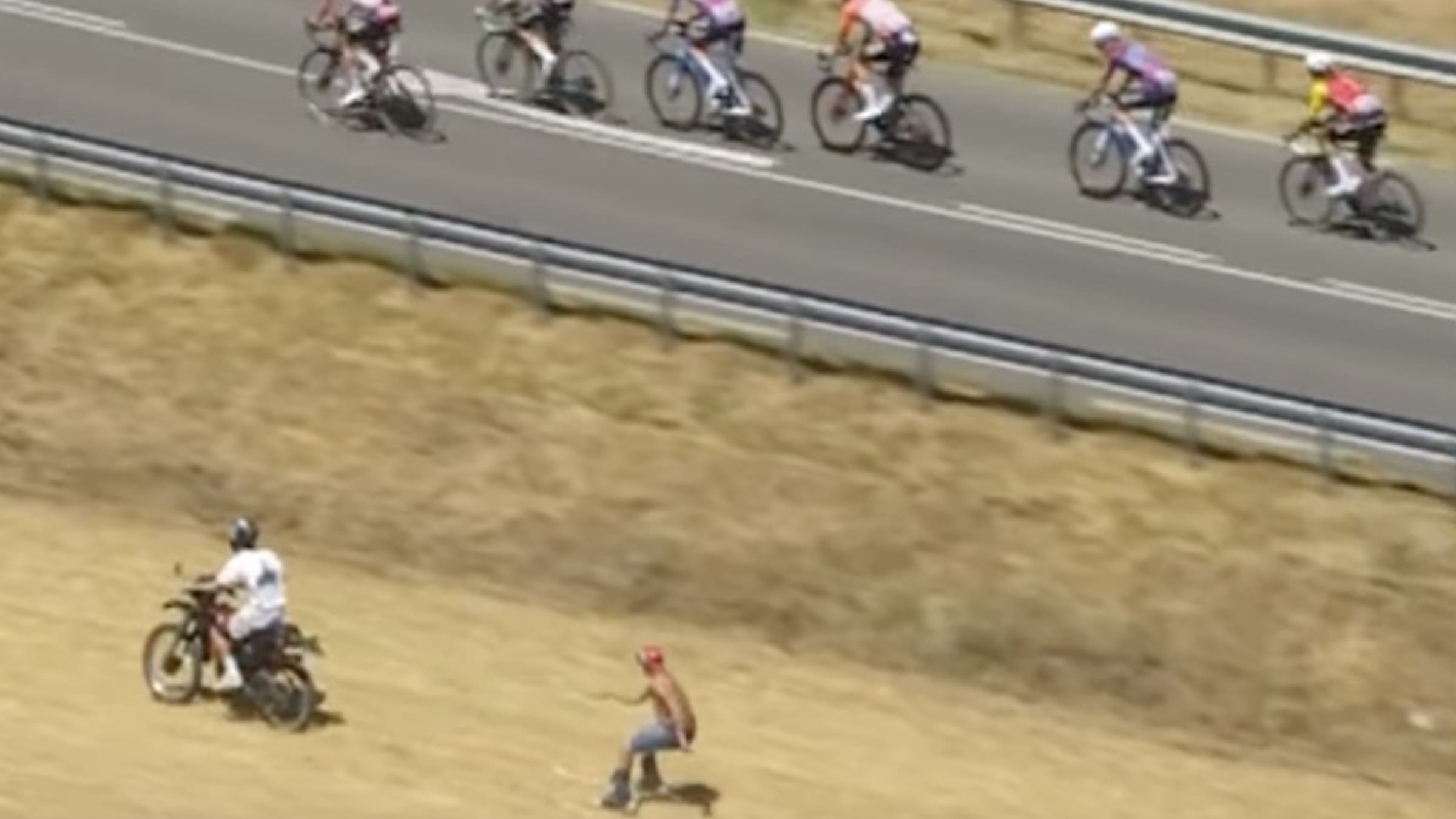 Skier Rides Behind Motorbike Alongside The Tour de France