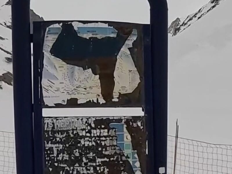 Dilapidated trail map at a South American ski resort.