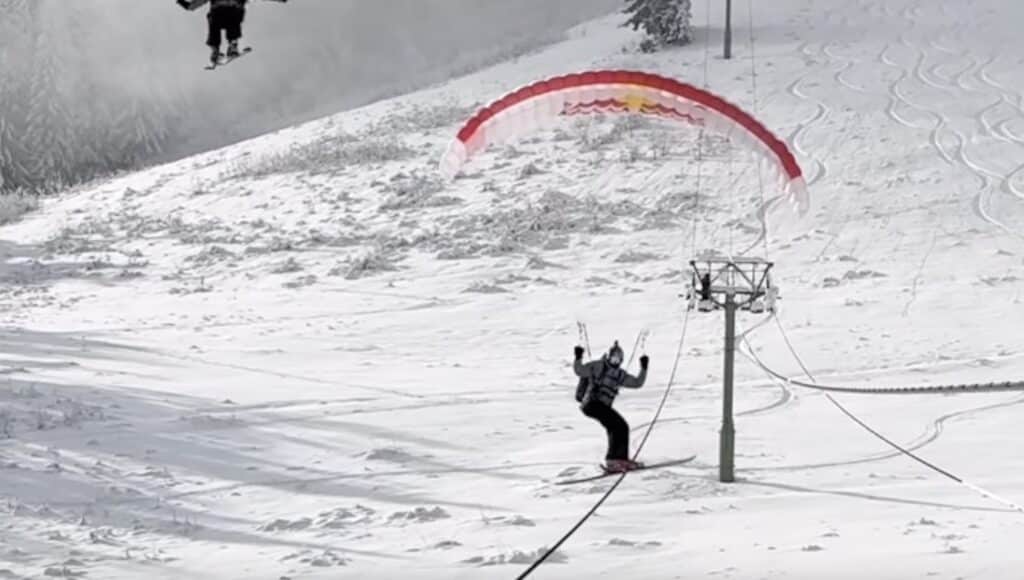 Speedrider Valentin Delluc grinds a chairlift cable.
