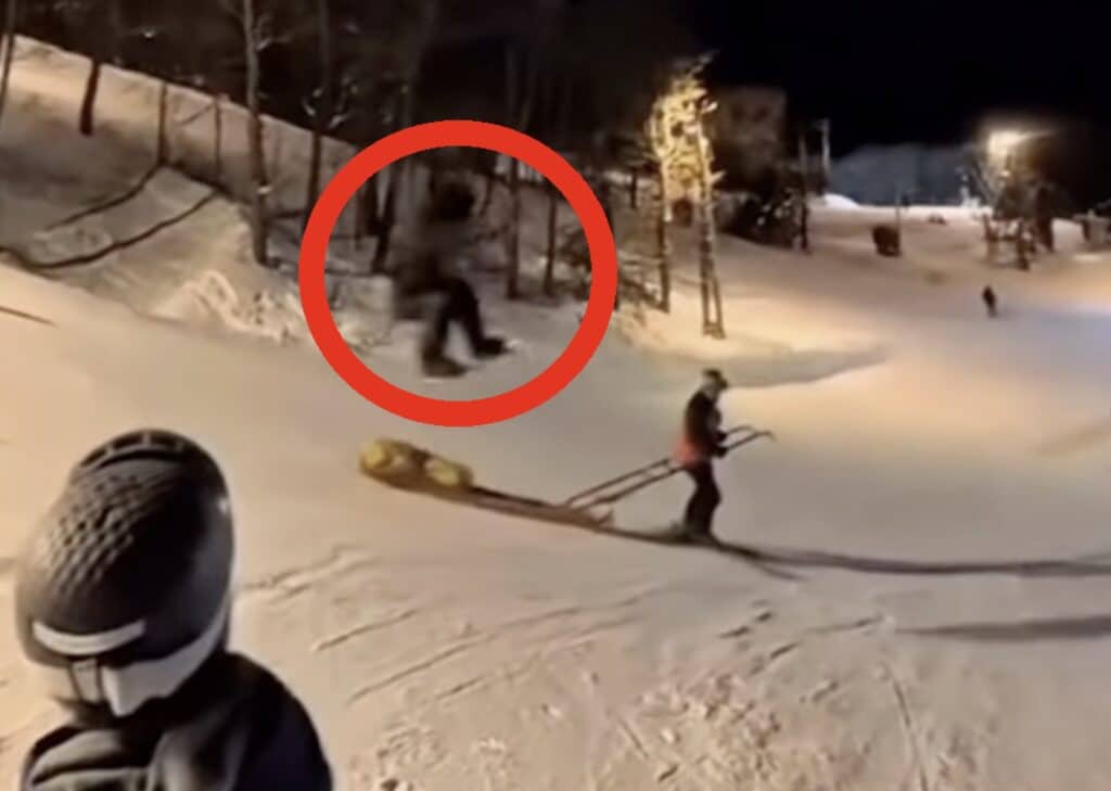 Snowboarder Lands Directly On Ski Patrol Rescue Toboggan