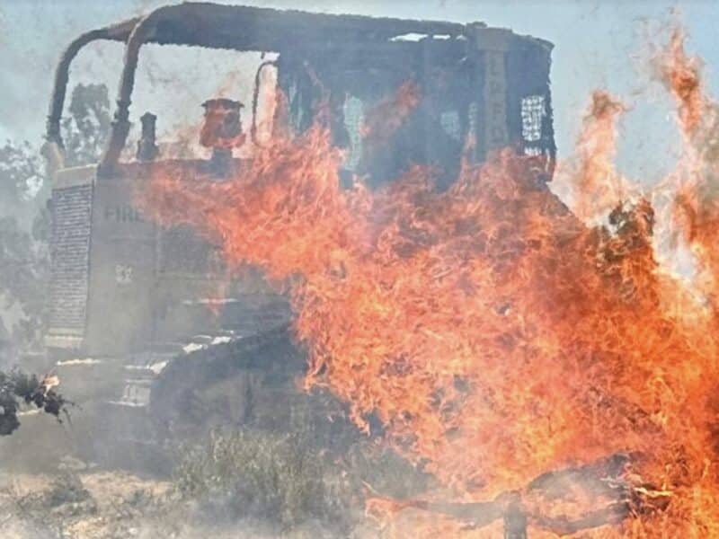 Most bulldozers have enclosed cabs with air conditioning and ventilation, allowing them to get closer to active fires.