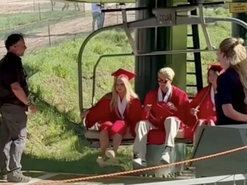Park City High School graduates ride a Deer Valley chairlift to their graduation ceremony.