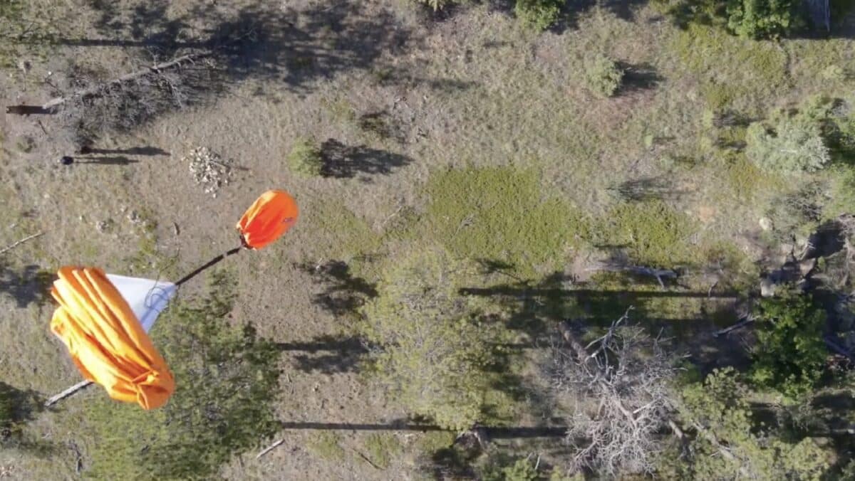 Rescue agency drops emergency supplies via drone.