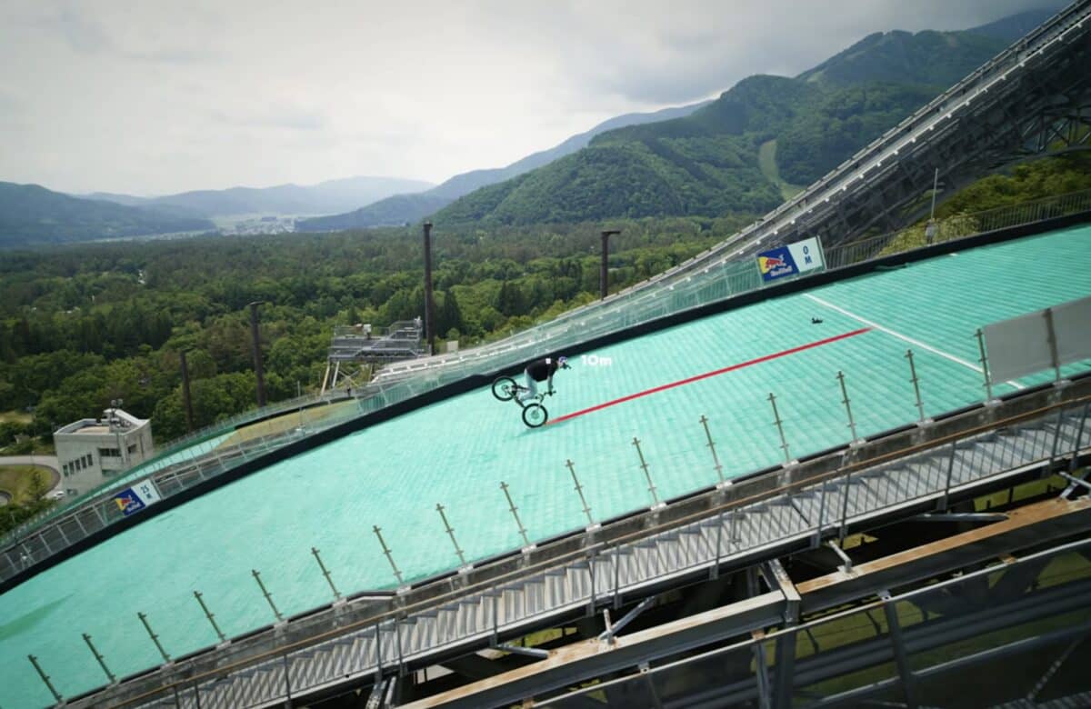 Japanese Biker Sets Two Guinness World Records on Olympic Ski Jump