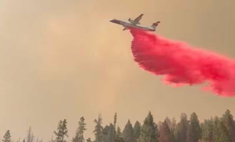 Dropping fire retardant around Elkhorn Hot Springs.