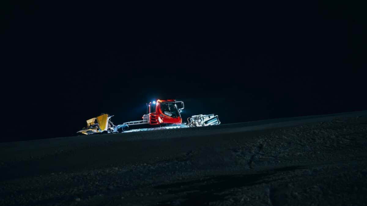Snow grooming at night.