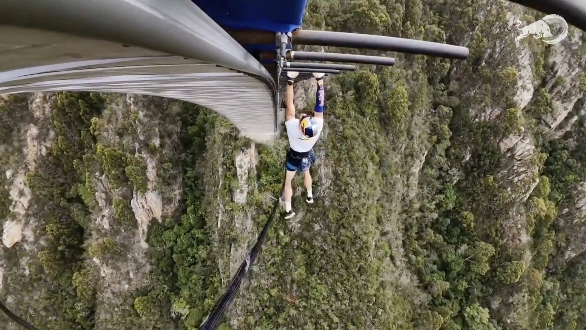 South African Athlete Crosses 600 Monkey Bars Suspended 216 Meters Above River