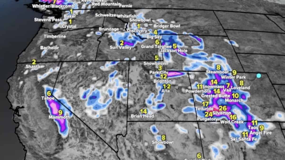 Satellite radar showing scattered snow and precipitation across mountain towns.