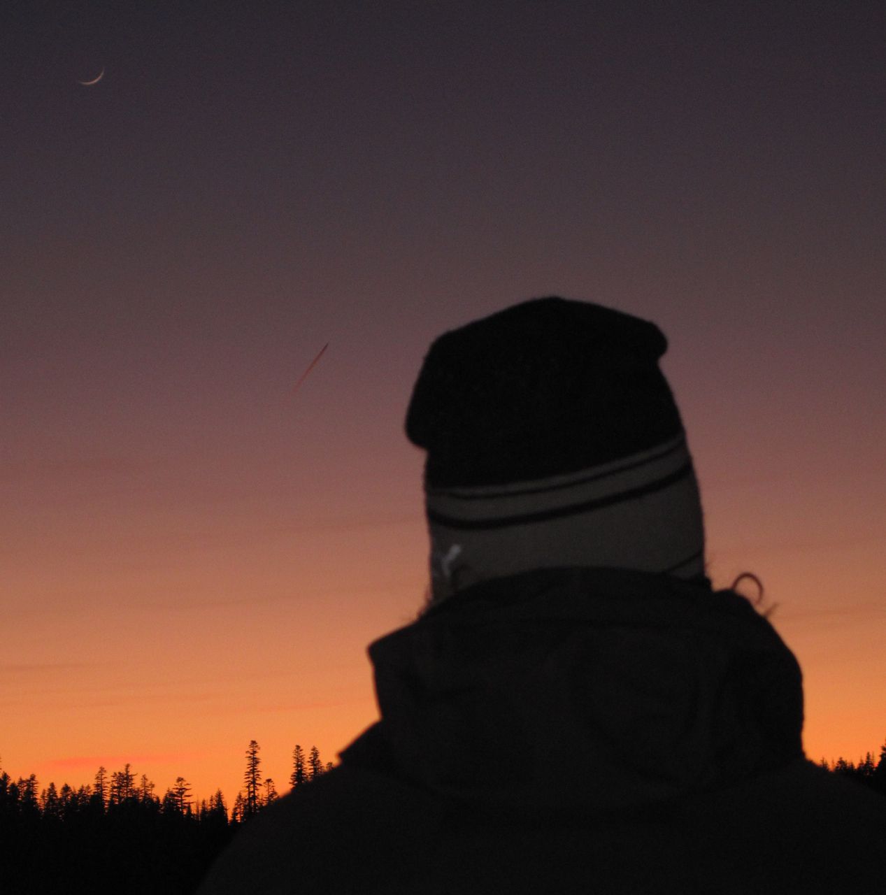 A sliver of moon over the Tahoe Backcountry at Sunset