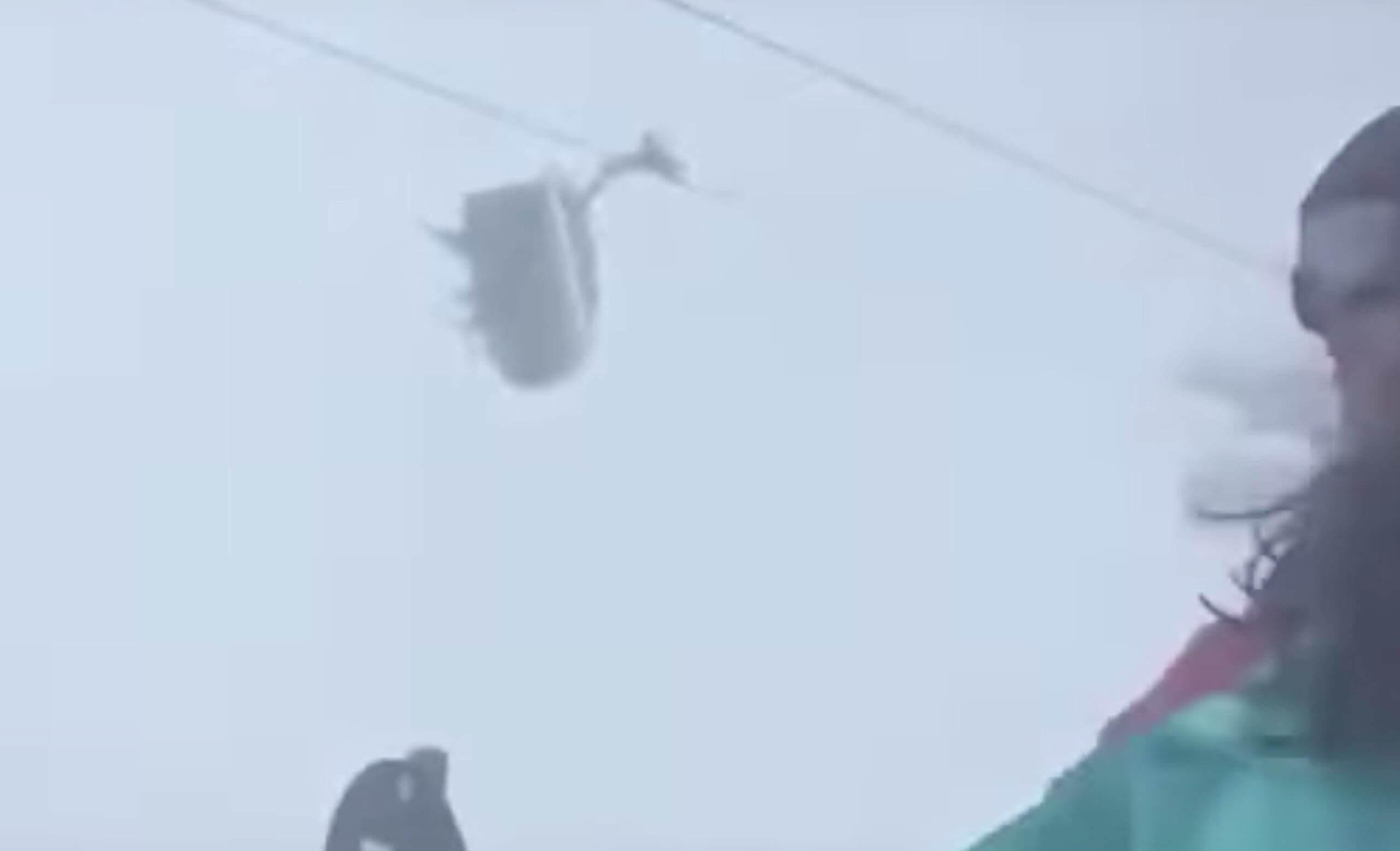 Skiers Stuck On Lift As Chairs Swing Nearly Inverted From High Winds