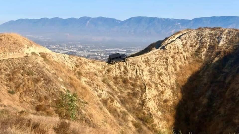 Abandoned Jeep Found Teetering On Ridge Trail