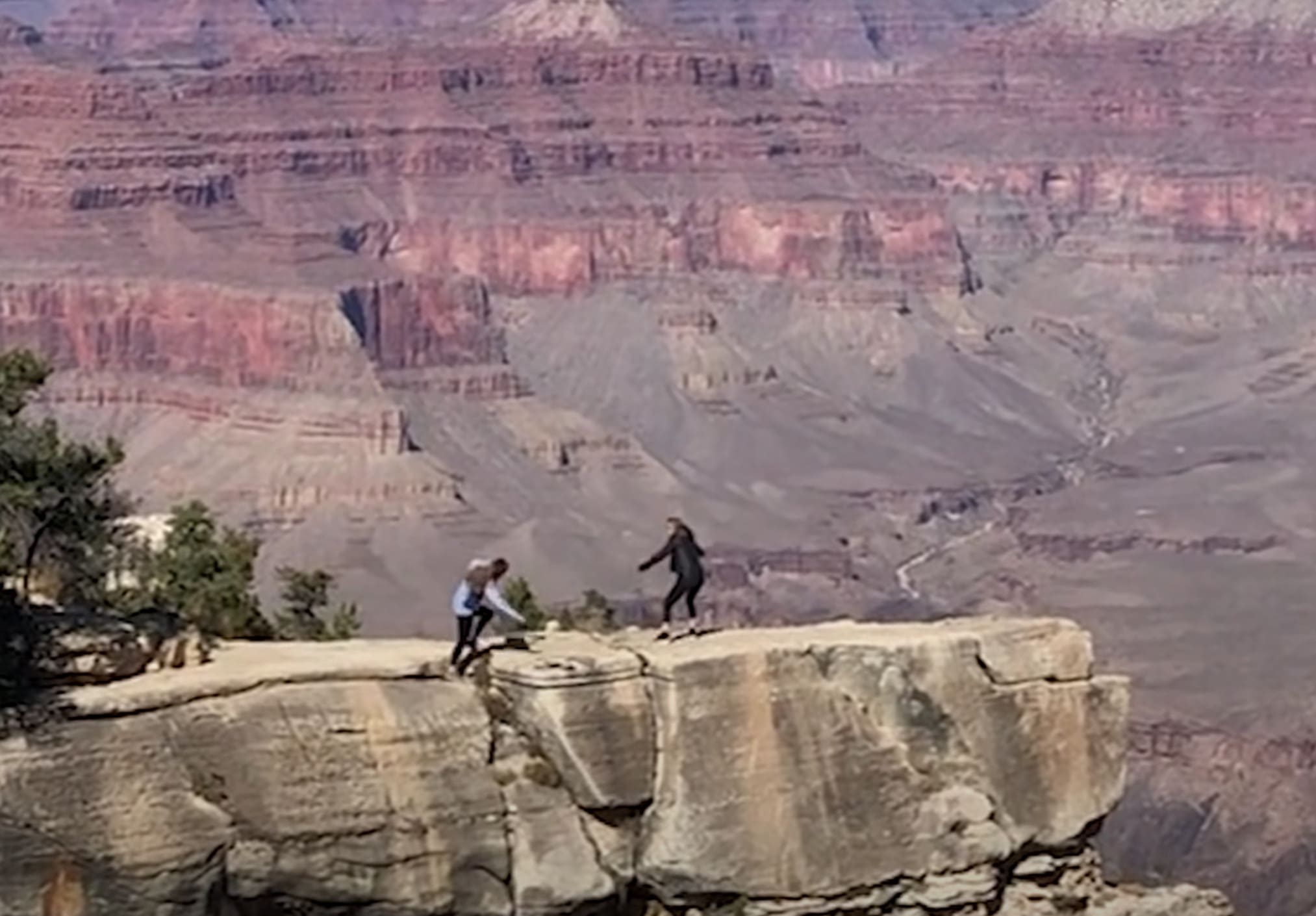 Terrifying Moment Woman Almost Falls Down Grand Canyon While Backing Up