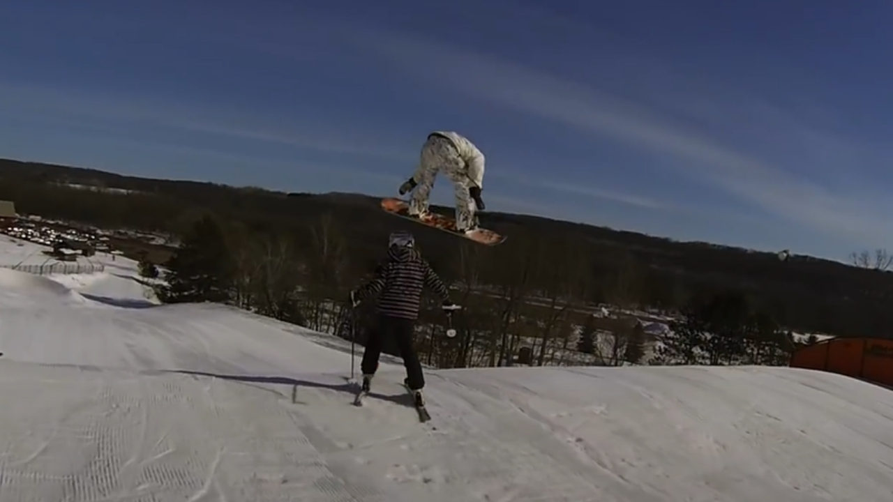 Snowboarder Jumps Over Clueless Skier Standing In The Landing (Watch)