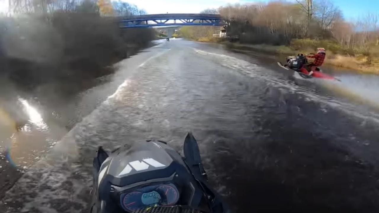 WATCH: Crazy Swedes Ride Snowmobiles On River For Miles