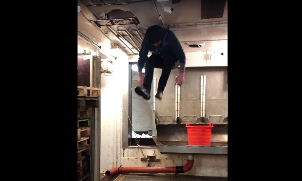 Fisherman Defies Gravity While Jumping on Board Boat