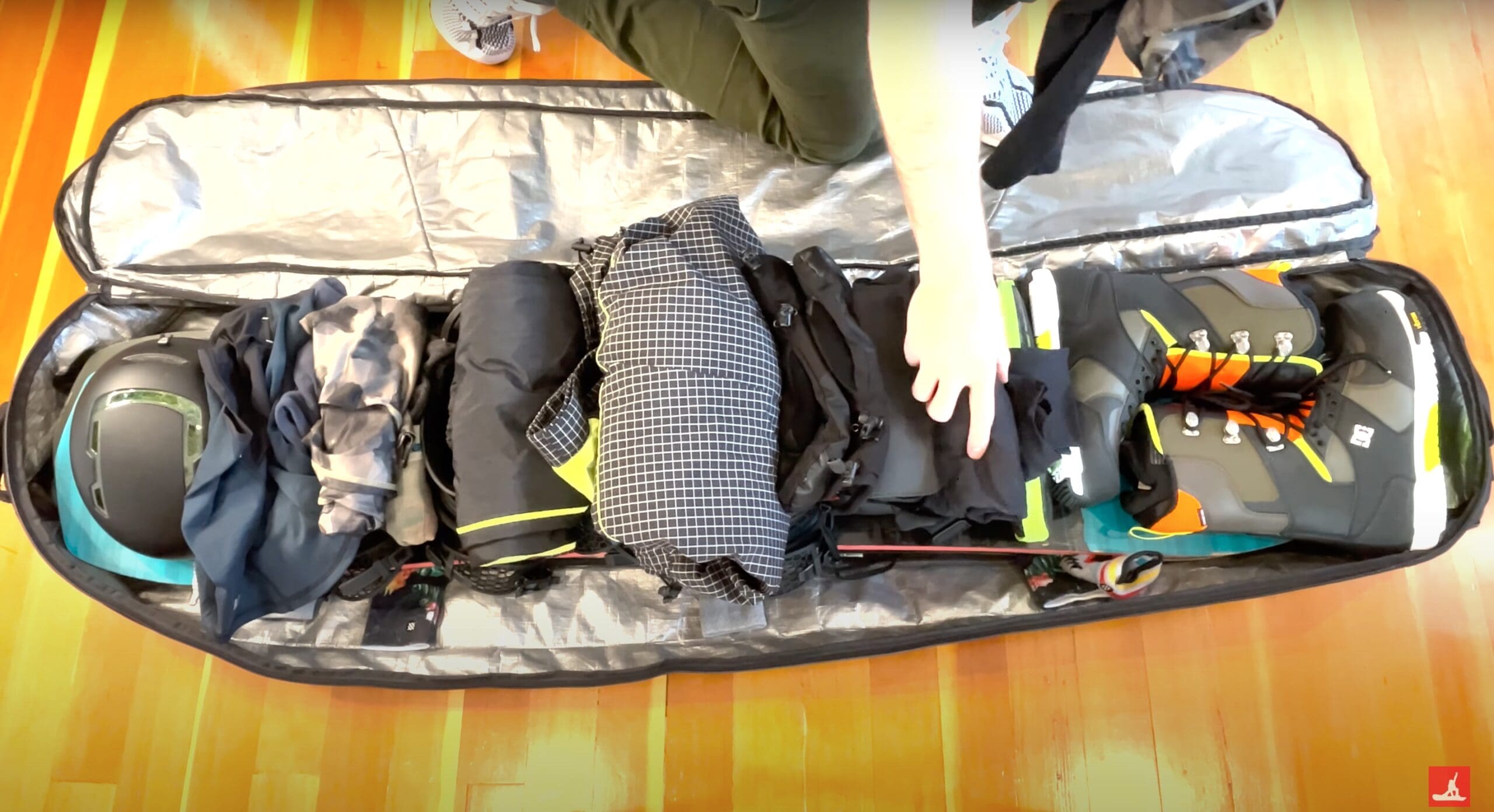 VIDEO Pro Tips For Packing Snowboard Bags