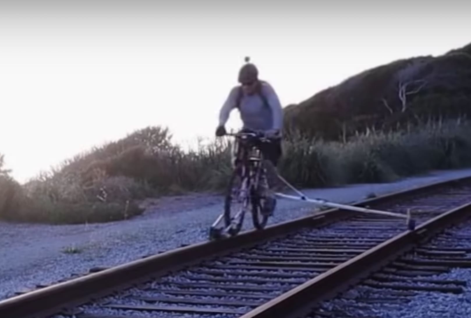 Engineer Creates Homemade Railroad Bike With Folding Outriggers