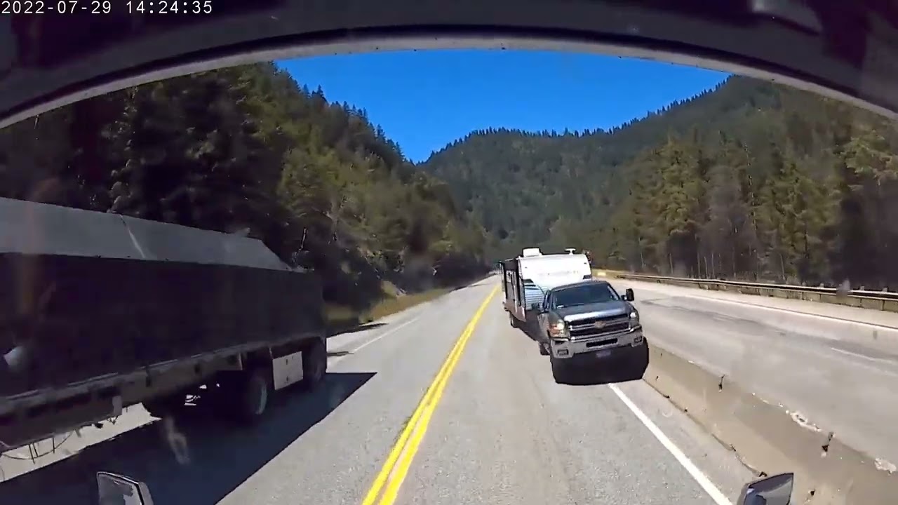 Truck Driver Dodges Head-On Collision On Mountain Pass (Video)