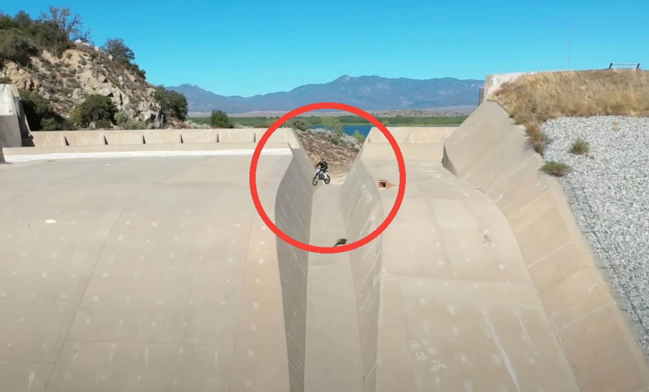 VIDEO: Dirt Biker Launches 114ft Down Dam Wall
