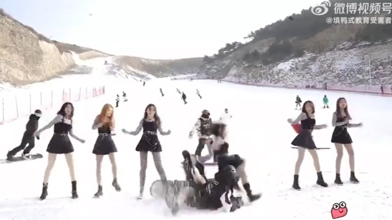 Snowboarder Takes Out Singers During Music Video Shoot (Watch)