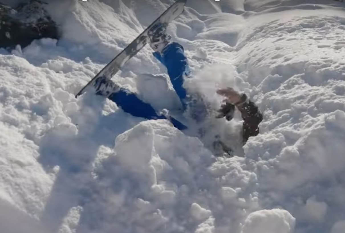 VIDEO: Snowboarder Rescues Friend Buried Face First In Snow